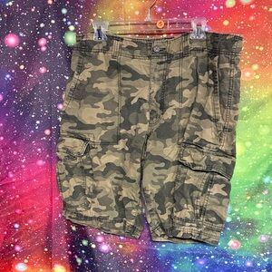 Goodfellow & Co white fabric label on olive-green camo